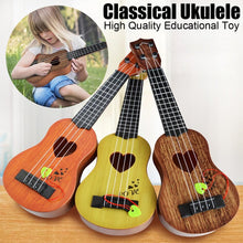 Load image into Gallery viewer, kids toys guitar Beginner Classical Ukulele Guitar Educational Musical Instrument Toy for Kids Funny instrumentos musicales#A30
